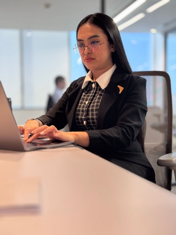 Professional reviewing her digital presence and online credibility